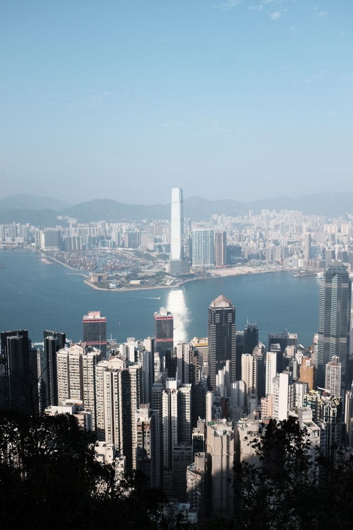 Mastering the First Impression: Your intriguing post title goes here Stunning skyline of Hong Kong with iconic skyscrapers and harbor view.